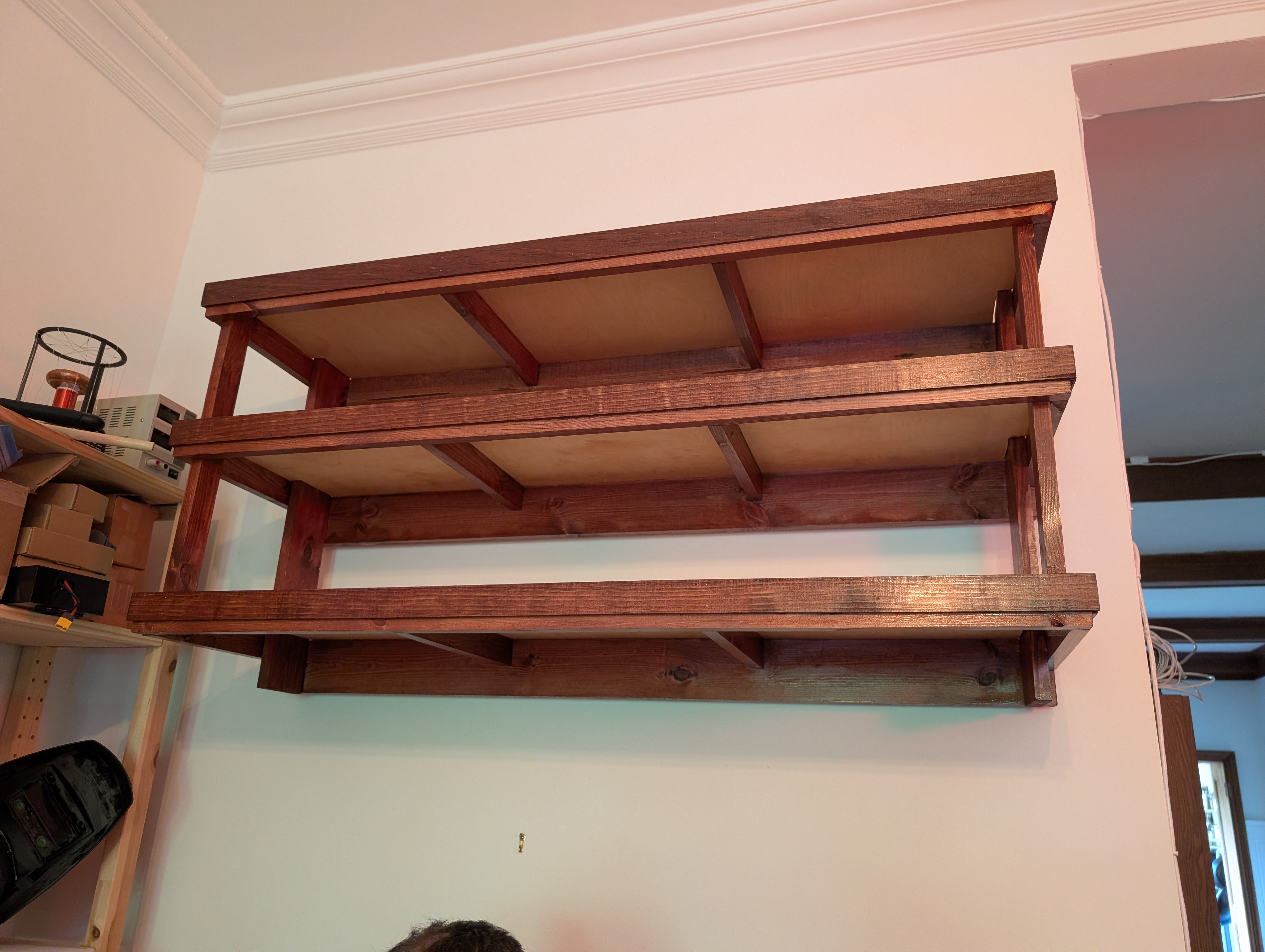 a shelf hanging on a wall