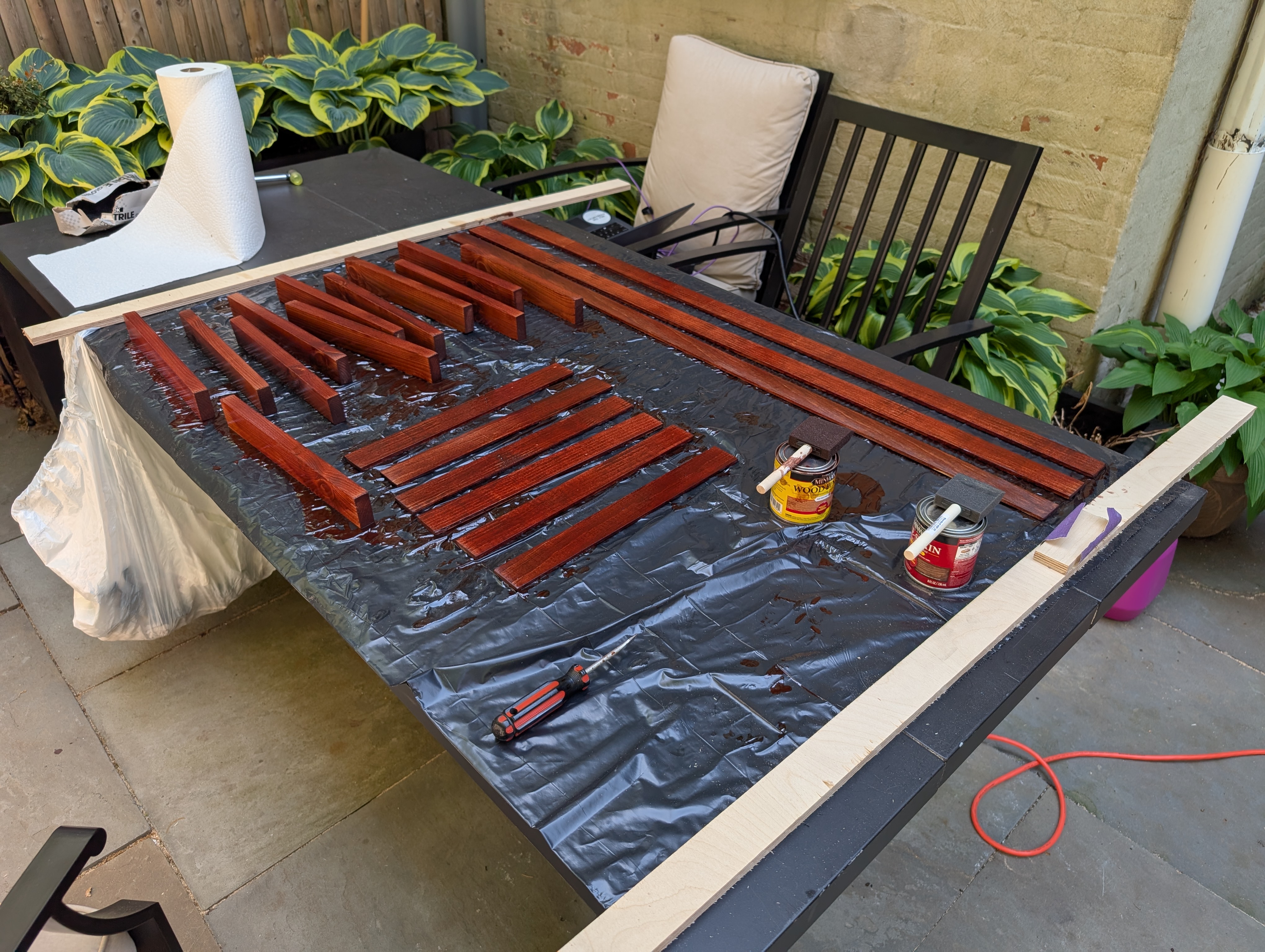 a bunch of wood, stained dark red