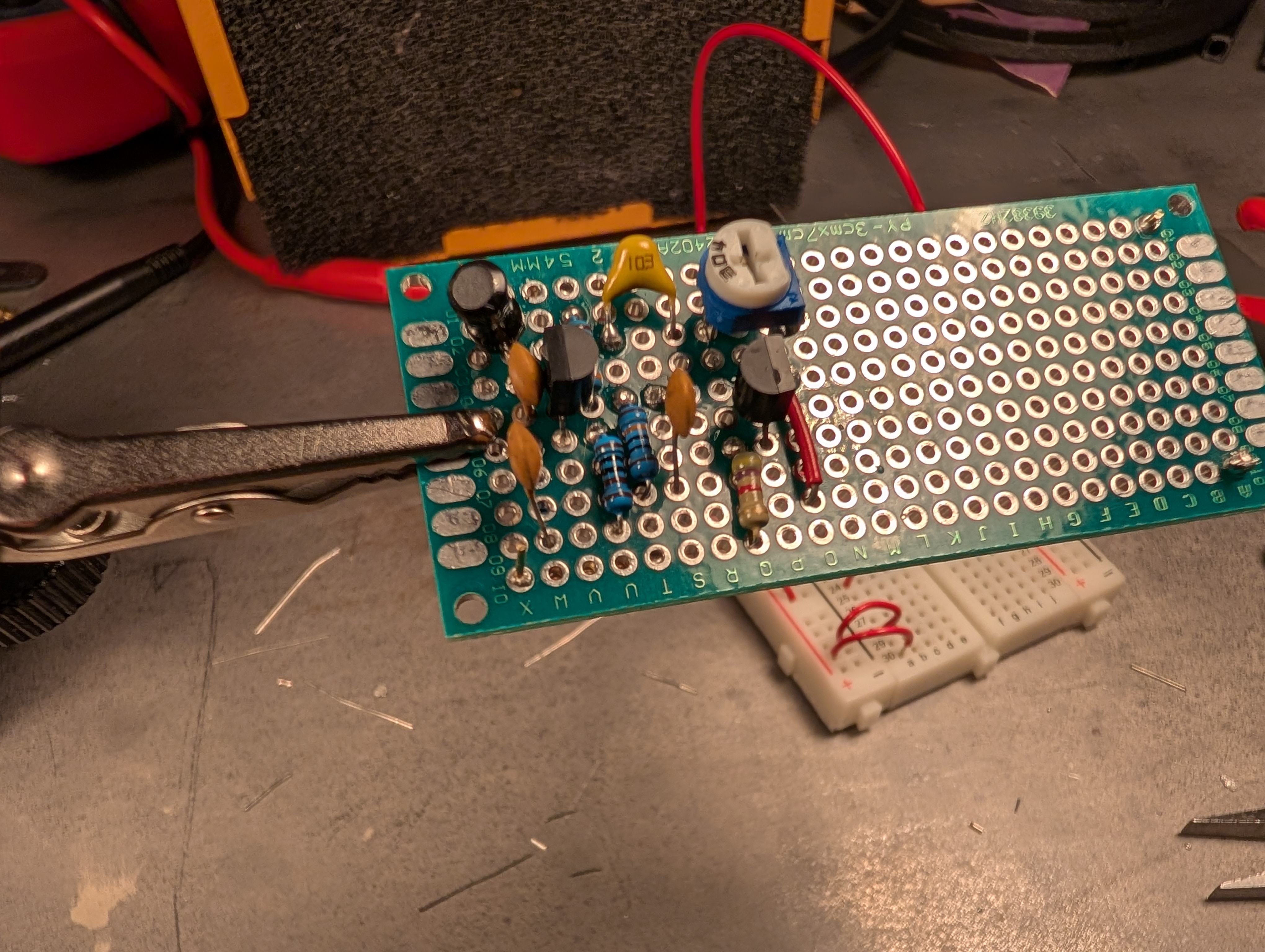 a photo of an oscillator circuit on perfboard.