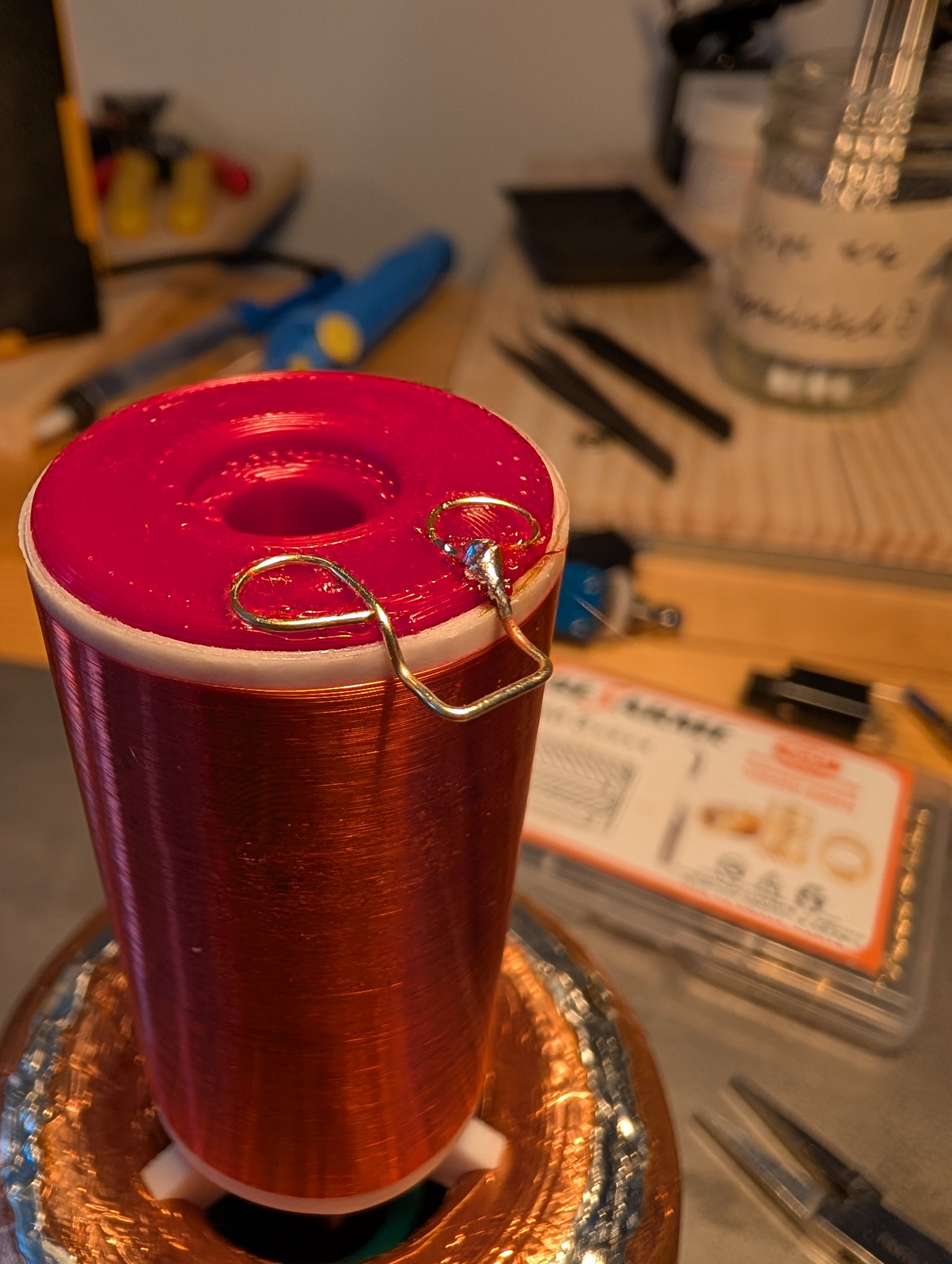 a rectangular bit of brass wire embedded in the base of the secondary coilform