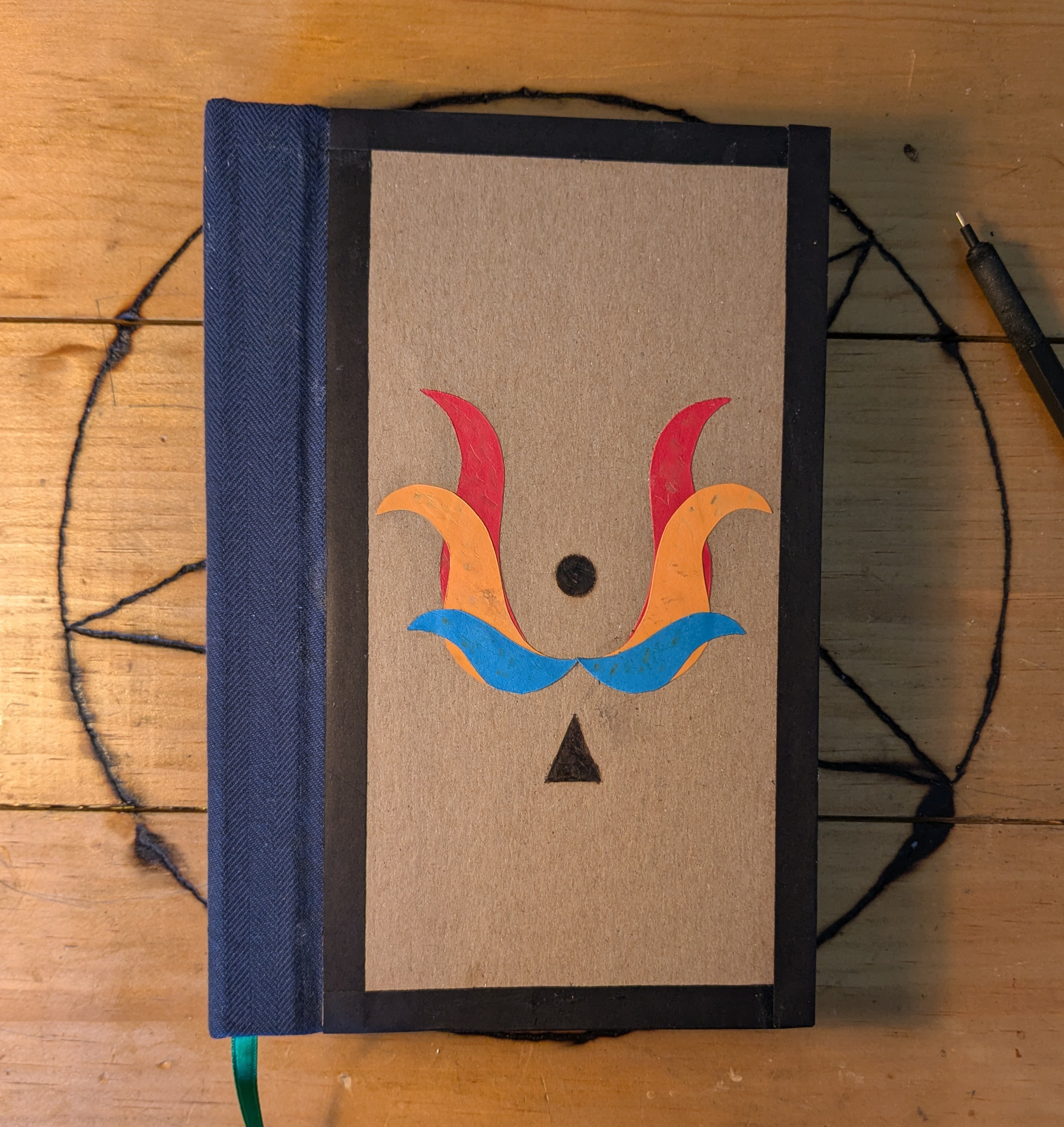 a notebook with a colorful cover